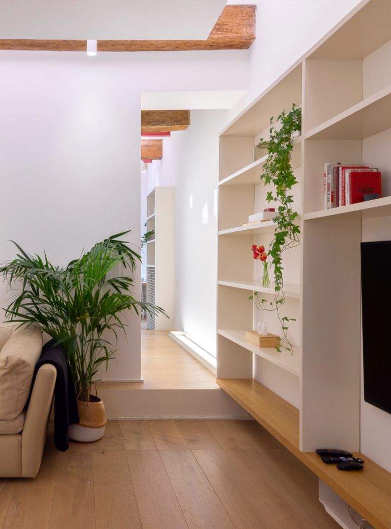 Elegant living room in a premium home in central Rome with designer furniture and natural light.